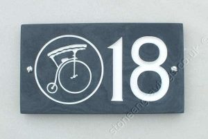 Unique custom house number sign with Penny Farthing image engraved.